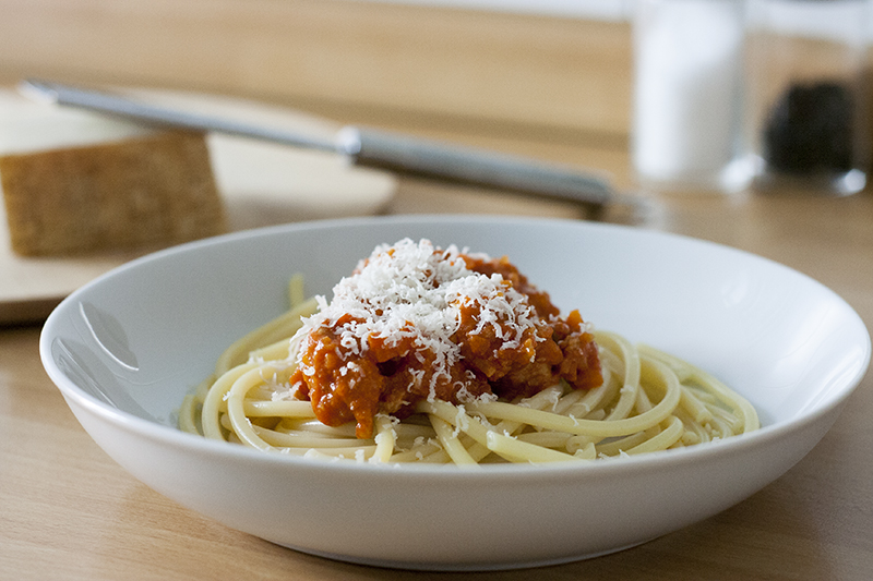 bowl of Turkey Bolognese with Parmesan cheese