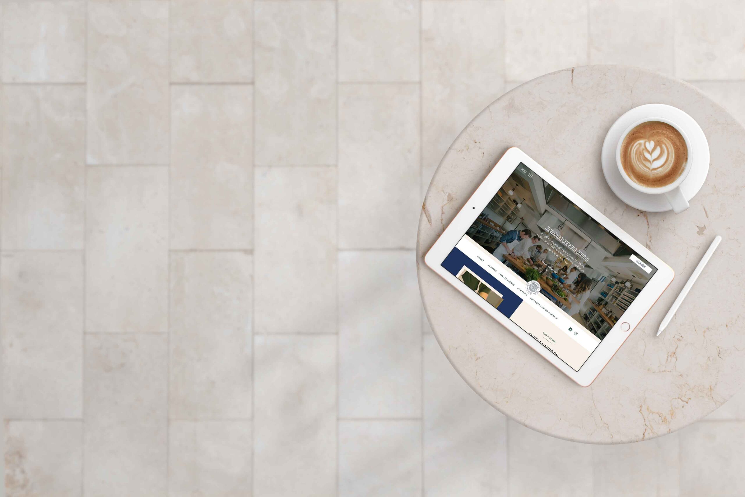 iPad on bistro table with coffee