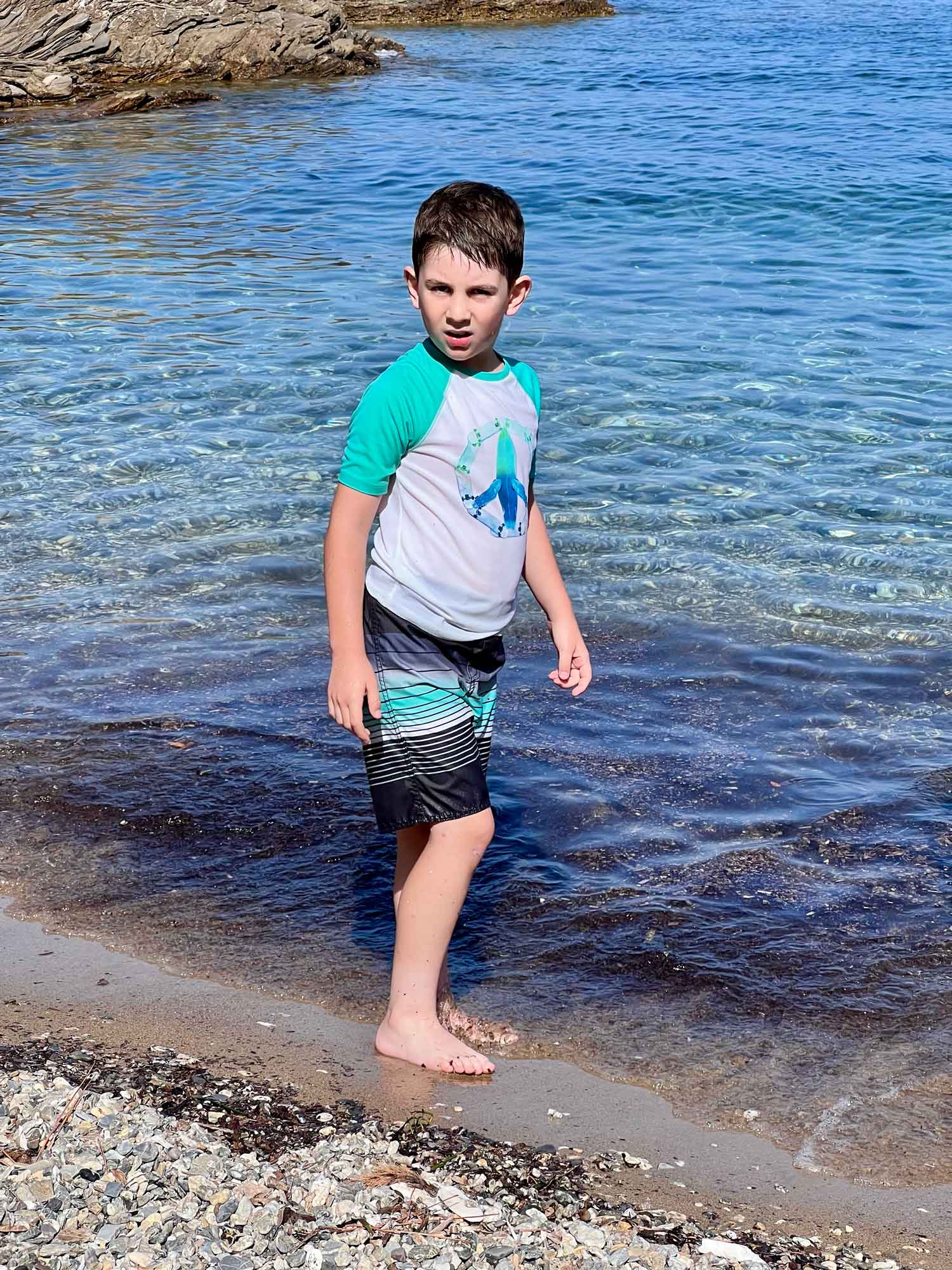 boy playing in the Mediterranean Sea
