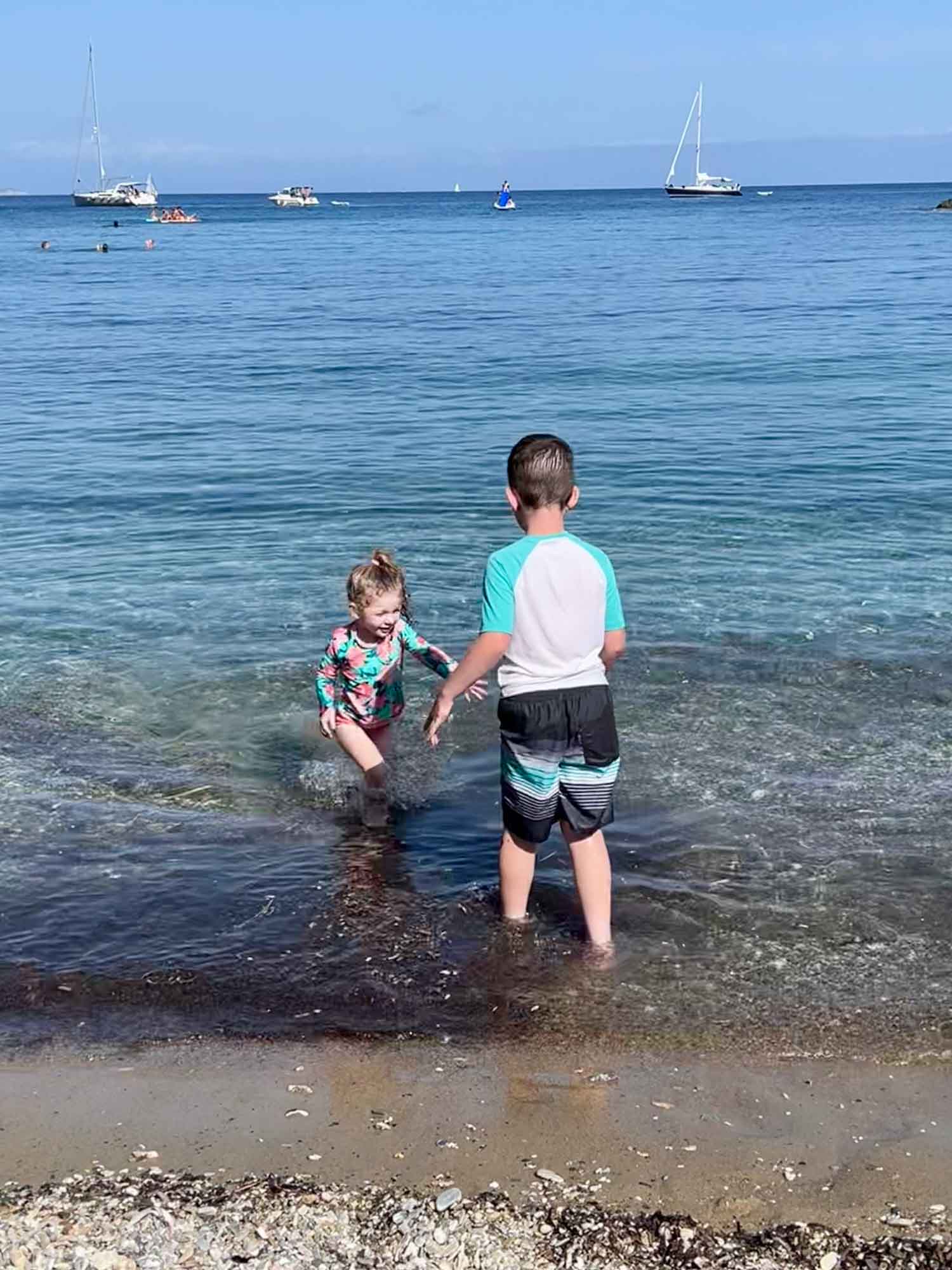two kids playing in the Mediterranean Sea