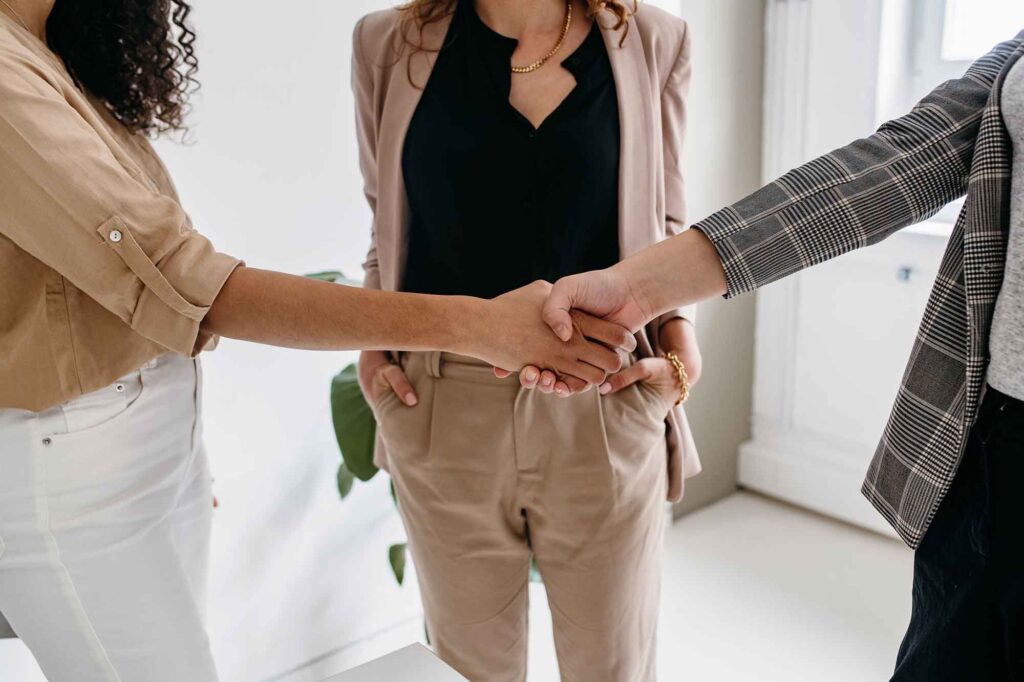 business women shaking hands