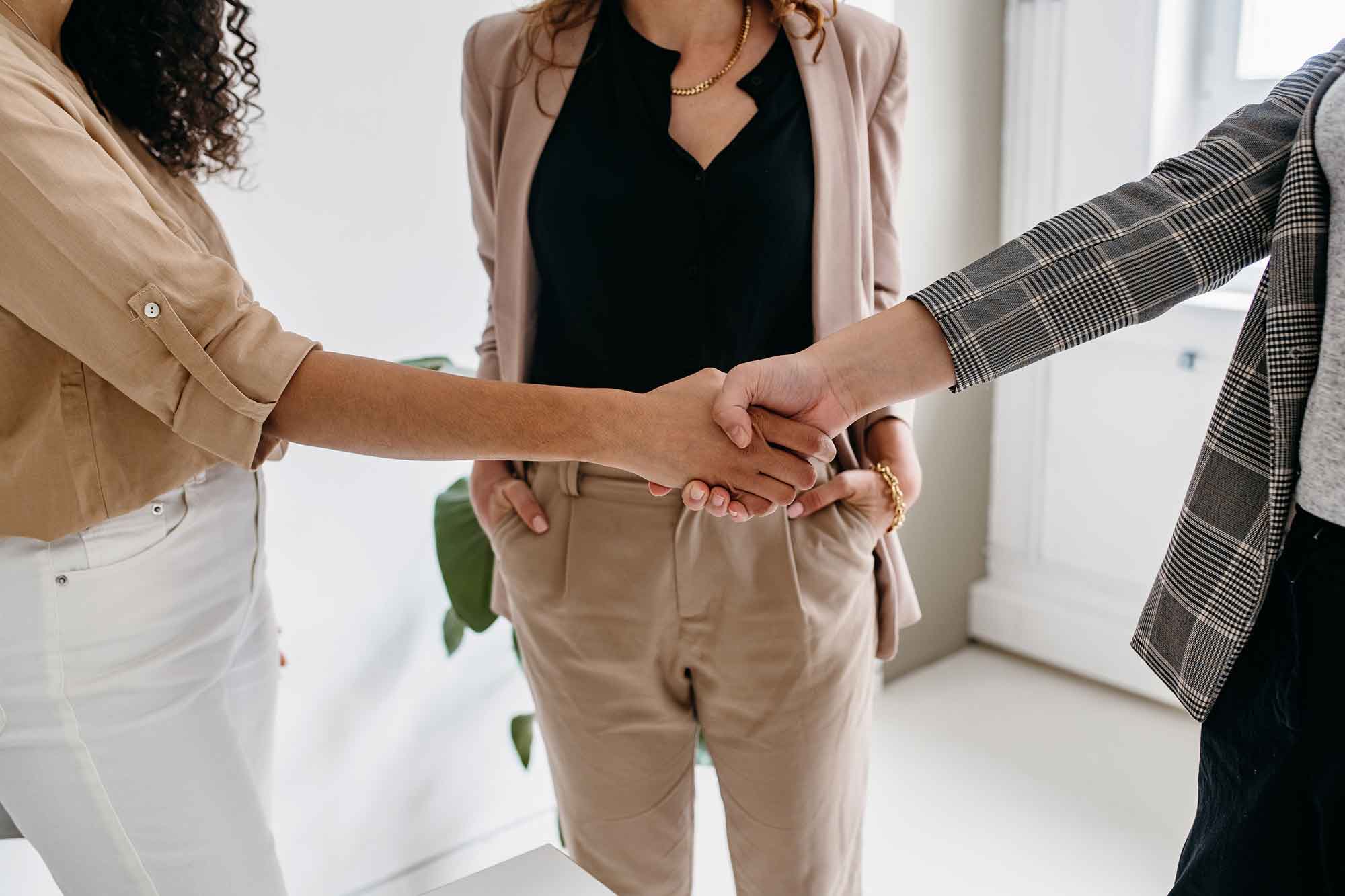 business women shaking hands