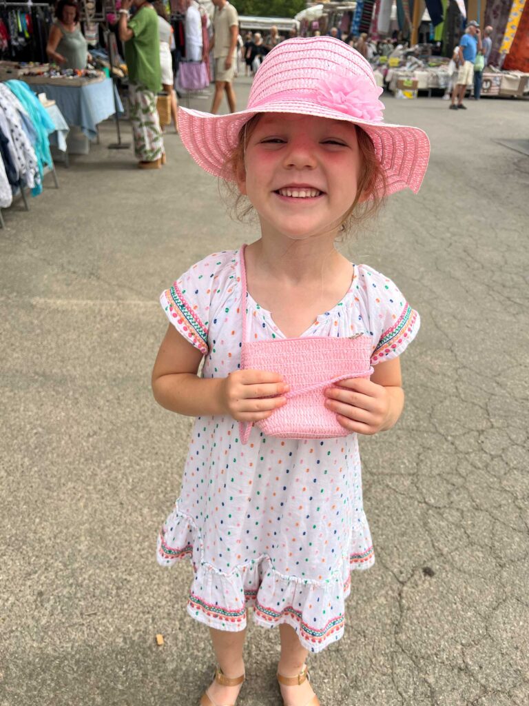 a pink sunhat and matching purse for Little Miss